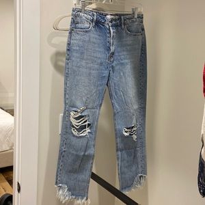 Medium wash mom jeans w knee holes